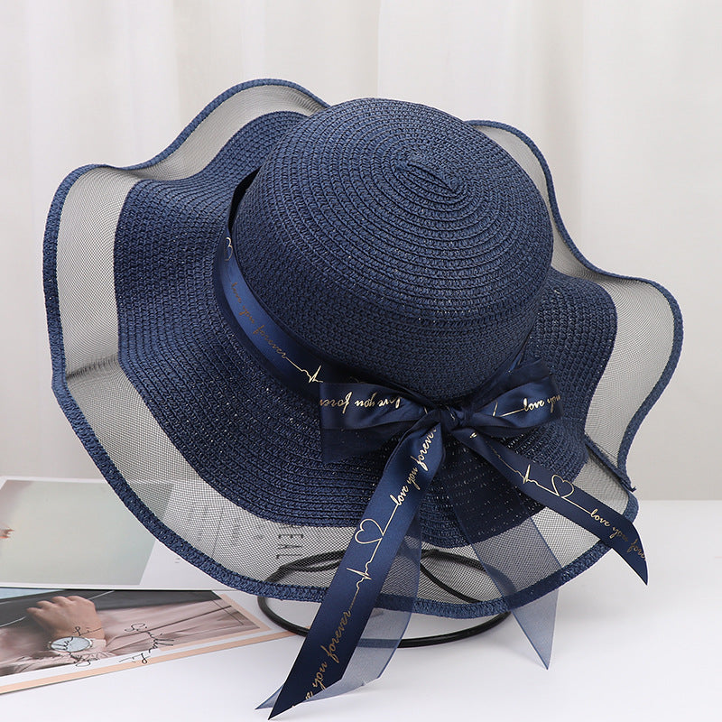 Women's Wide Wavy Brim Straw Sun Hat — Sheer Mesh Edge, Statement Bow, 5 Colors
