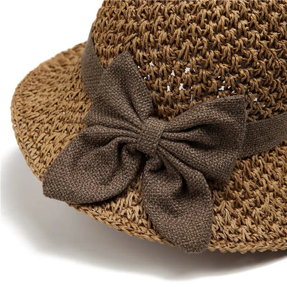 🎀Women's Hand-Knitted Summer Straw Hat, Wide Brim Foldable Beach Hat with Elegant Bow Detail