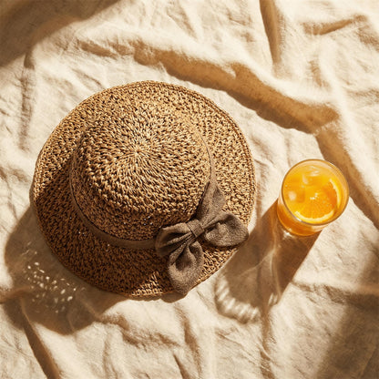 🎀Women's Hand-Knitted Summer Straw Hat, Wide Brim Foldable Beach Hat with Elegant Bow Detail