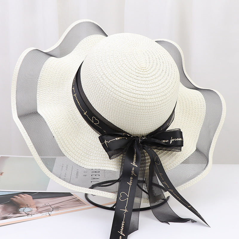 Women's Wide Wavy Brim Straw Sun Hat — Sheer Mesh Edge, Statement Bow, 5 Colors