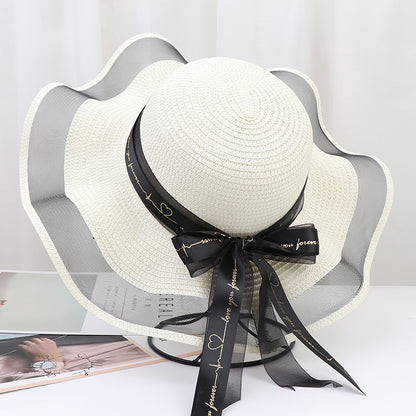 Women's Wide Wavy Brim Straw Sun Hat — Sheer Mesh Edge, Statement Bow, 5 Colors