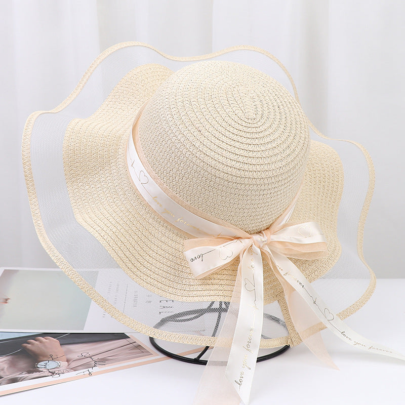 Women's Wide Wavy Brim Straw Sun Hat — Sheer Mesh Edge, Statement Bow, 5 Colors