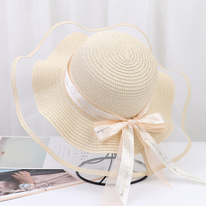 Women's Wide Wavy Brim Straw Sun Hat — Sheer Mesh Edge, Statement Bow, 5 Colors