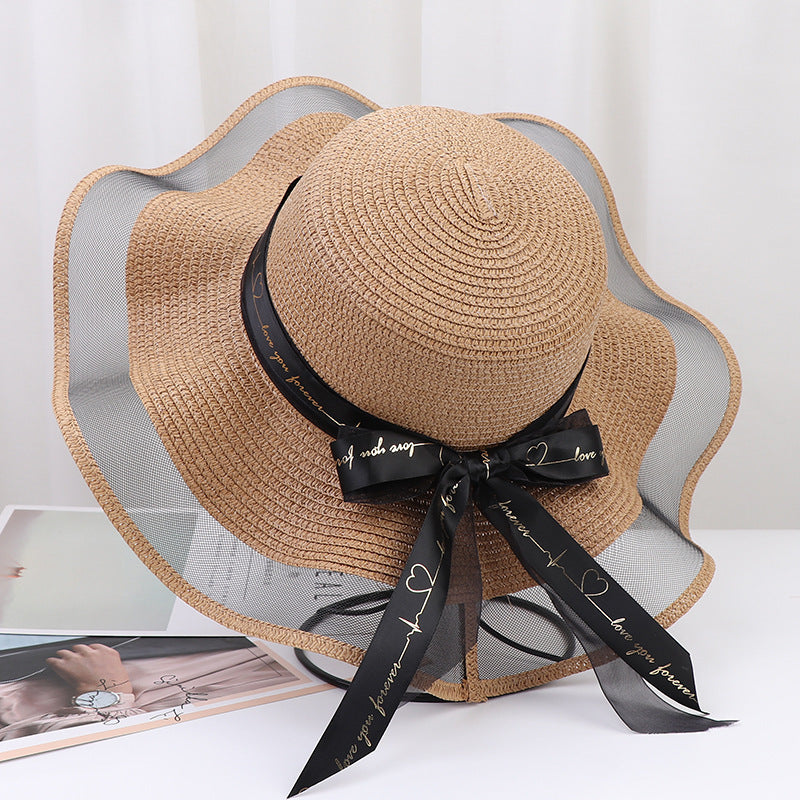 Women's Wide Wavy Brim Straw Sun Hat — Sheer Mesh Edge, Statement Bow, 5 Colors