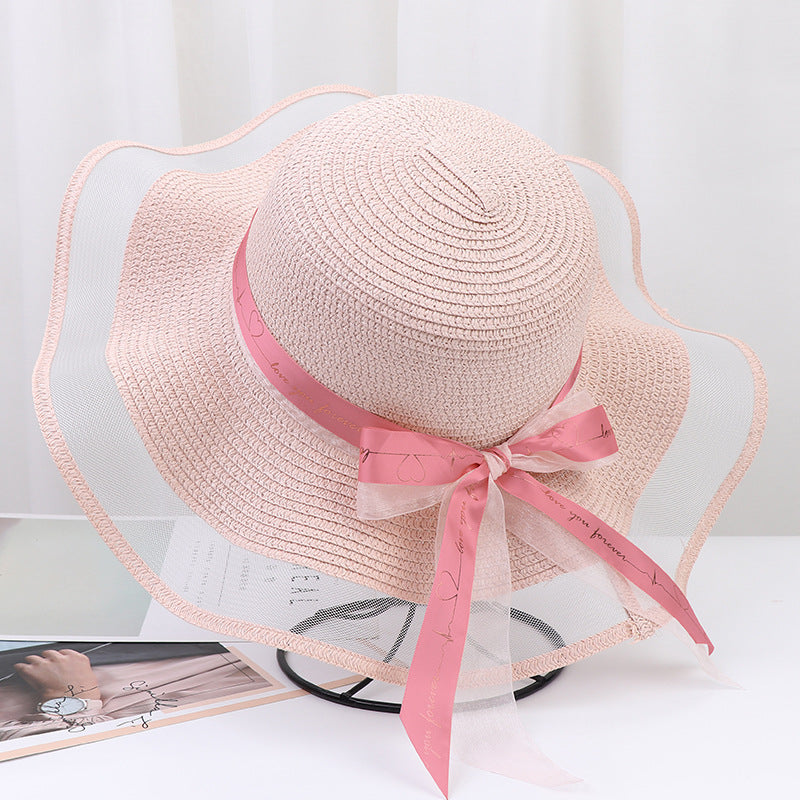 Women's Wide Wavy Brim Straw Sun Hat — Sheer Mesh Edge, Statement Bow, 5 Colors