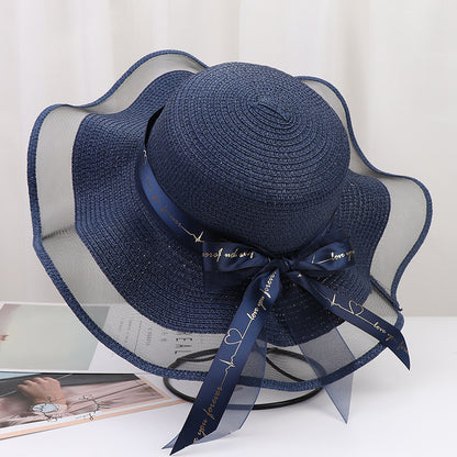 Women's Wide Wavy Brim Straw Sun Hat — Sheer Mesh Edge, Statement Bow, 5 Colors
